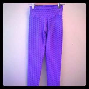 Purple anti-cellulite workout pants